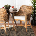 Load image into Gallery viewer, Baxton Studio Kyle Modern Bohemian Natural Brown Woven Rattan Dining Arm Chair With Cushion
