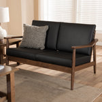 Load image into Gallery viewer, Baxton Studio Venza Mid-Century Modern Walnut Wood Black Faux Leather 2-Seater Loveseat
