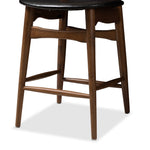 Load image into Gallery viewer, BAXTON STUDIO FLORA MID-CENTURY MODERN BLACK FAUX LEATHER UPHOLSTERED WALNUT FINISHED COUNTER STOOL (SET OF 2)
