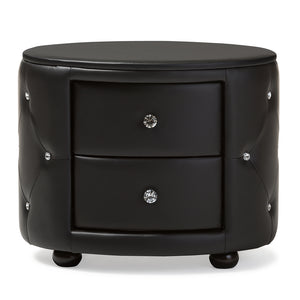 Baxton Studio Davina Hollywood Glamour Style Oval 2-Drawer Black Faux Leather Upholstered Nightstand